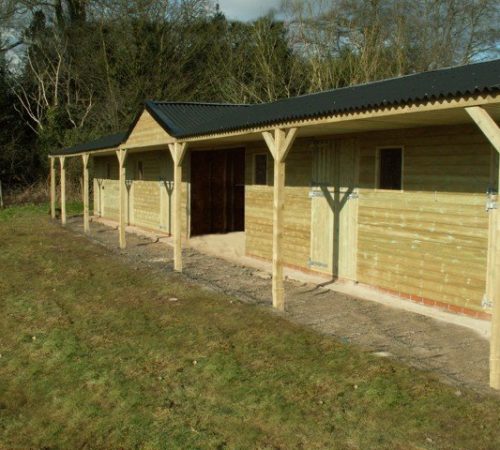 fixed-timber-stable-block-with-centre-hay-barn-angle.jpg